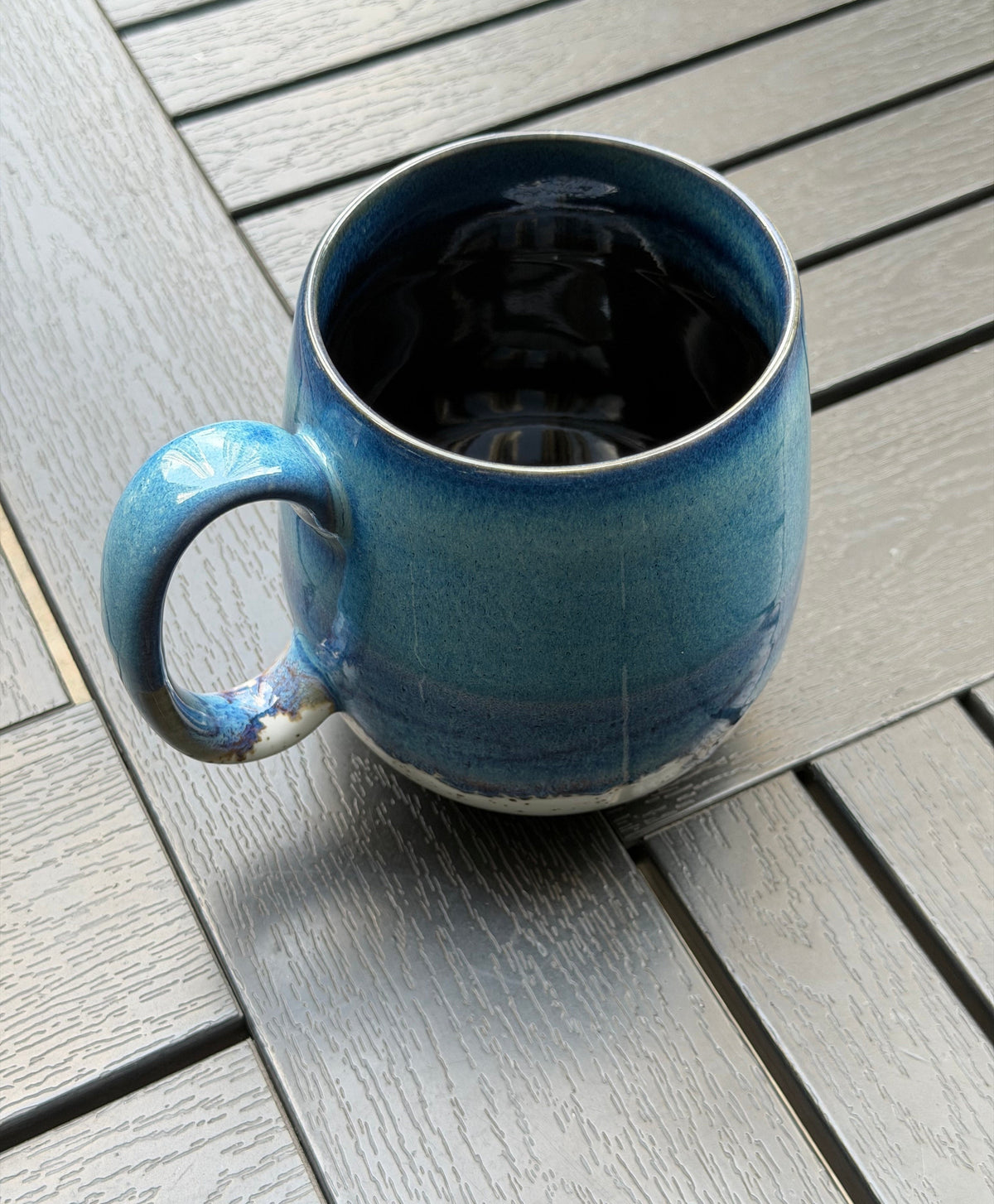 Top view of 27 oz Coastal Tide mug showing its wide opening and deep blue glazed interior