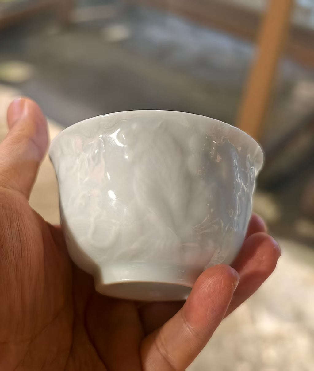 Hand-carved Tiger Chinese Zodiac porcelain tea cup by Jingdezhen artist Yan Wenlu