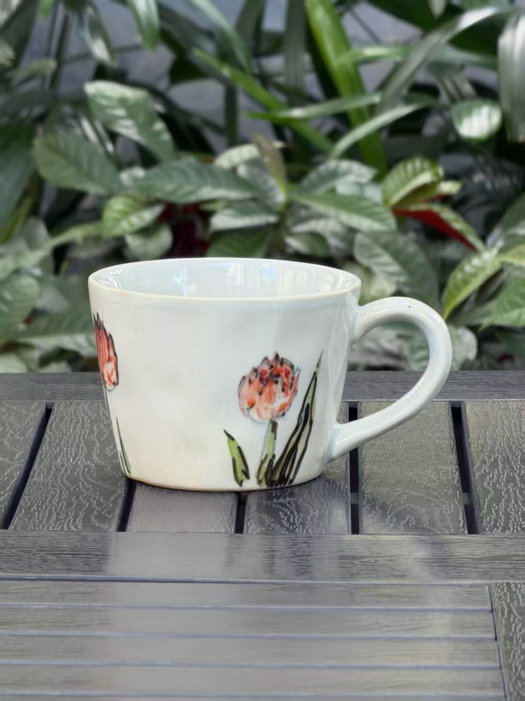 Orange Tulip hand-painted stoneware mug with expressive freehand floral brushwork