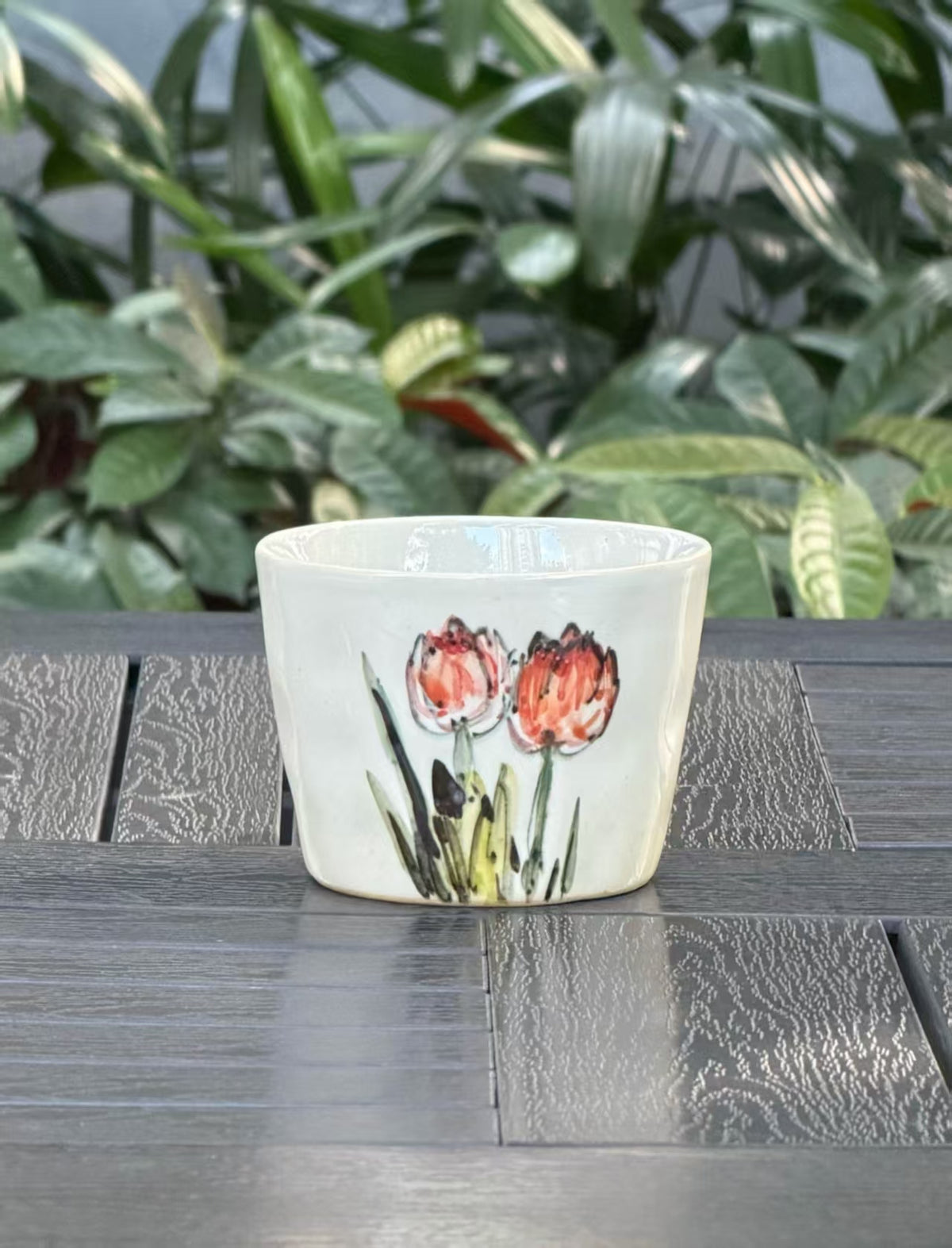 Reverse side of hand-painted Orange Tulip mug with individually painted floral design
