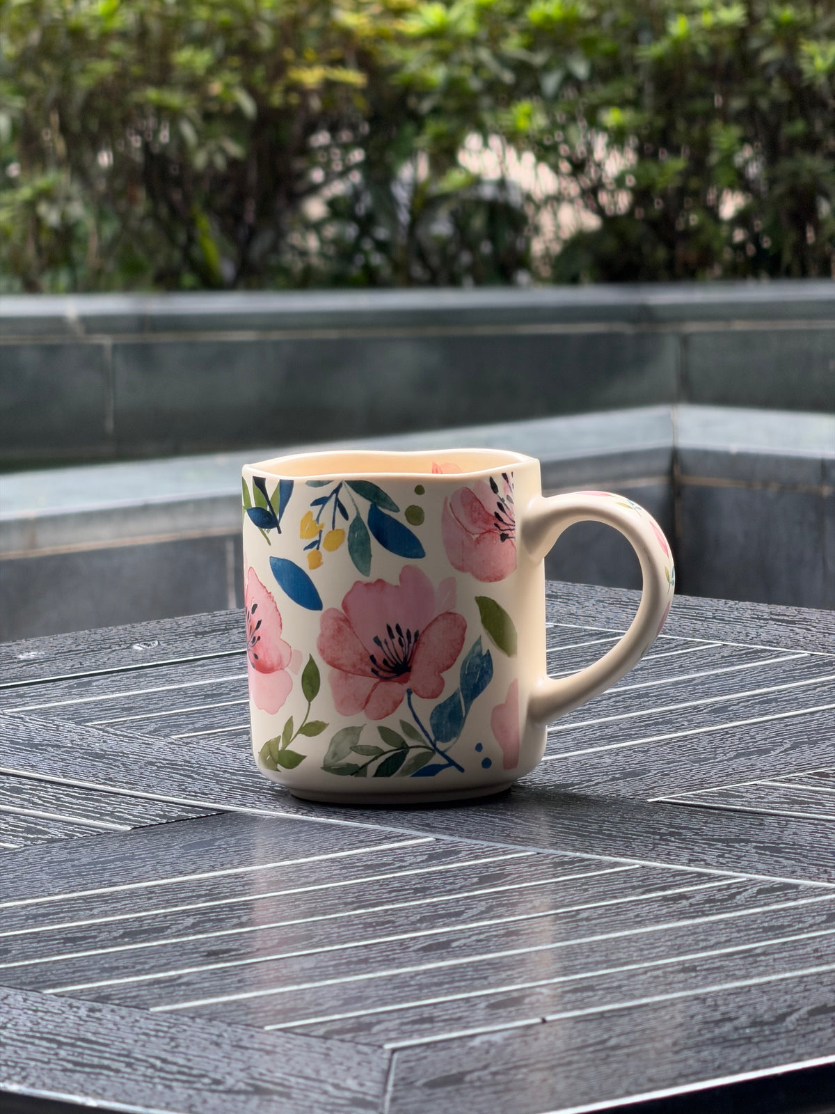 Soft Bloom ceramic mug showing its wavy rim, substantial body, and comfortable rounded handle