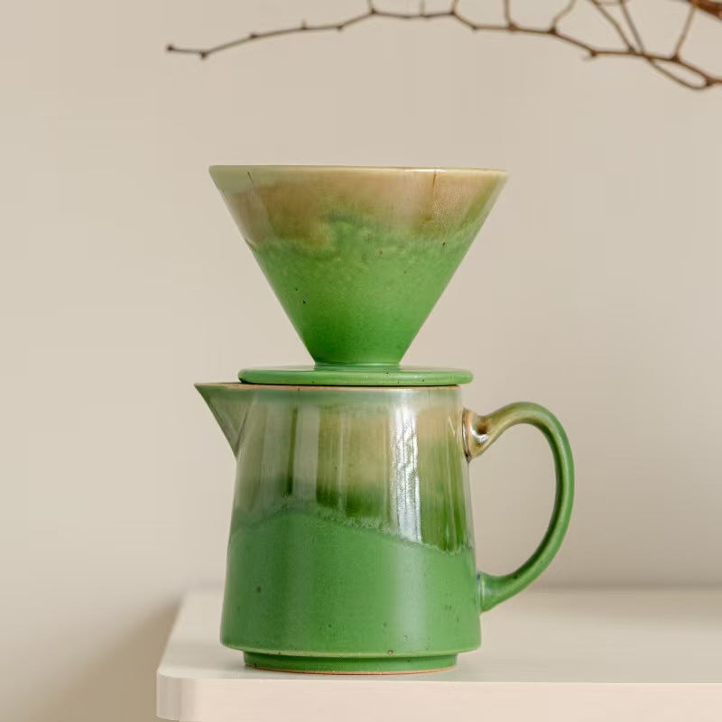 Verdant green ceramic pour-over coffee set with dripper and server on white surface