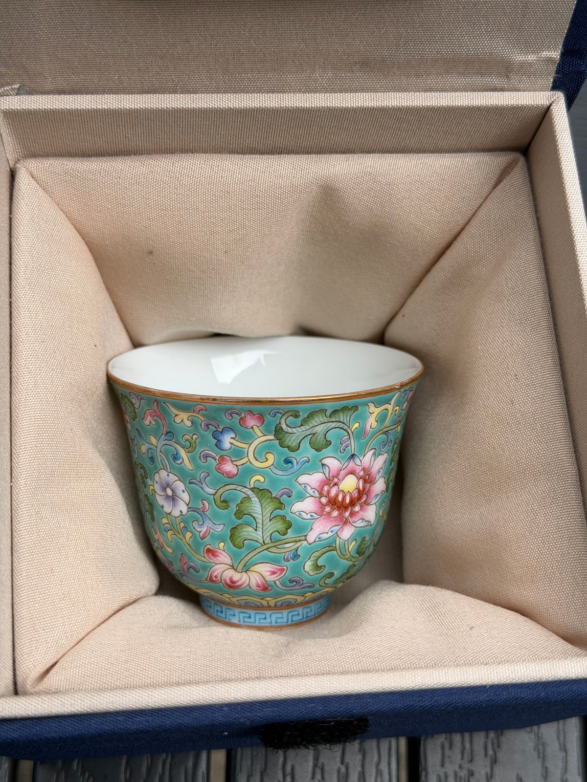 Floral porcelain teacup presented inside its fitted gift box